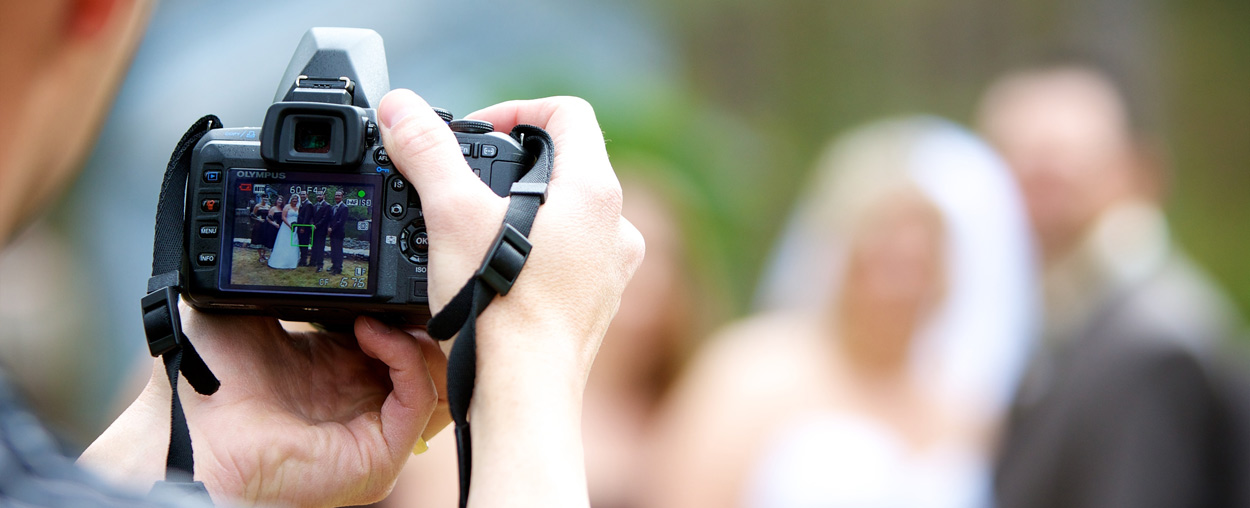 A photographer at a wedding