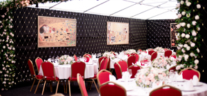 table settings in a wedding marquee