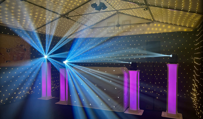 A DJ booth set up at a wedding