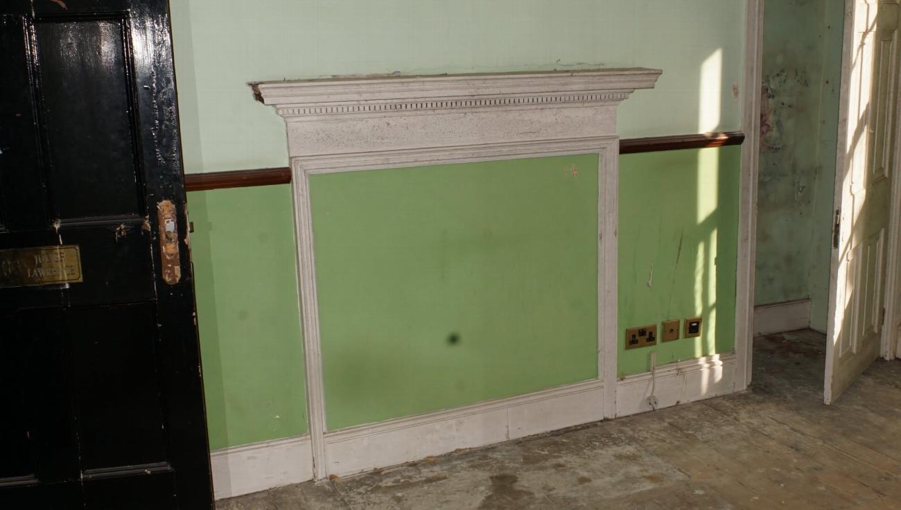 Stripped panelling in the Judge Alverstone room before restoration