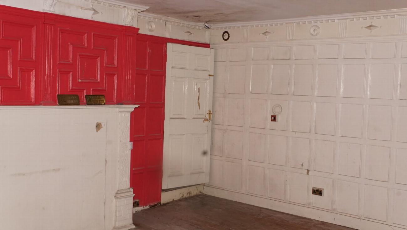 The Judge Huddlestone room before restoration, with later fittings in place