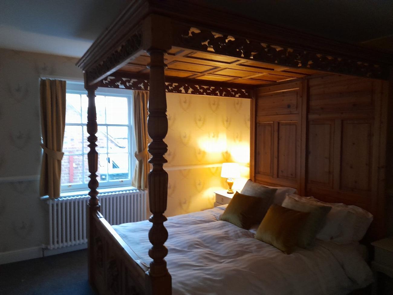 The restored Judge Kay room with its carved four-poster bed