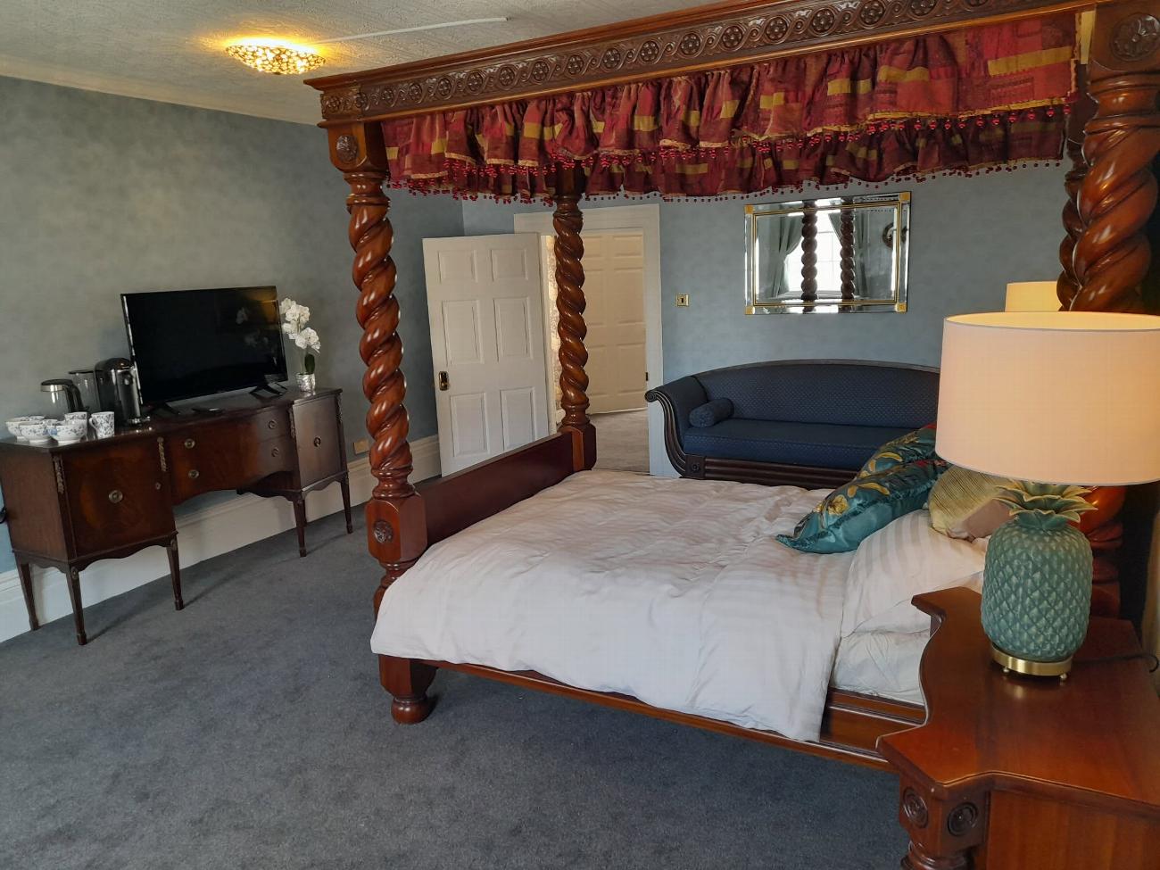 The restored Judge Melish Maidstone Suite with its four-poster bed