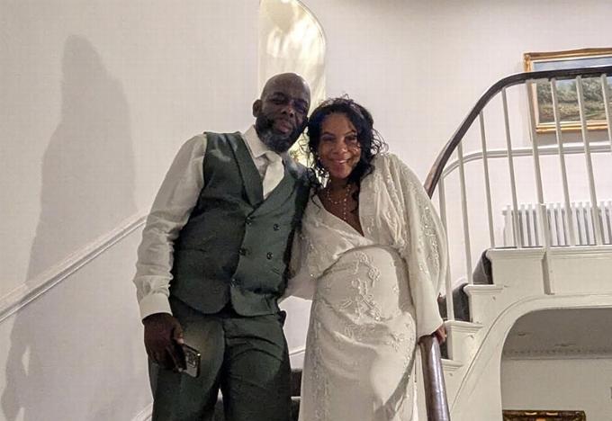Couple on stairs at wedding