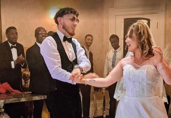 bride and groom dancing