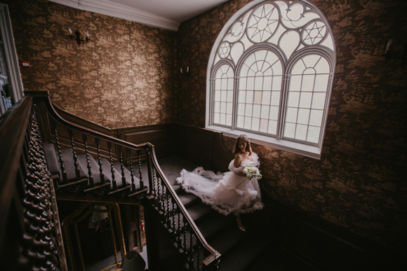 A bride walking down the stairs