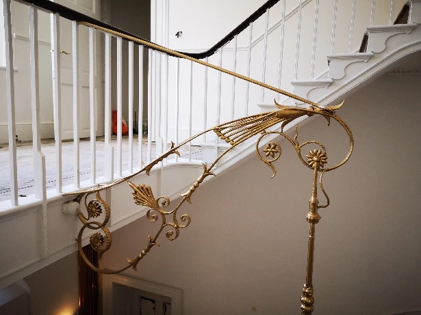 Ironwork detailing on the White Regency Staircase after restoration