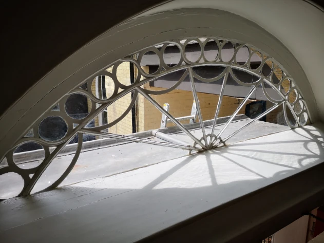 Staircase window at Stone Court House after restoration