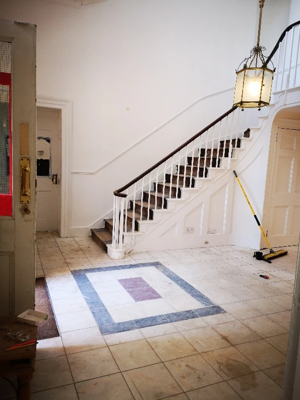 Staircase hall at Stone Court House before restoration